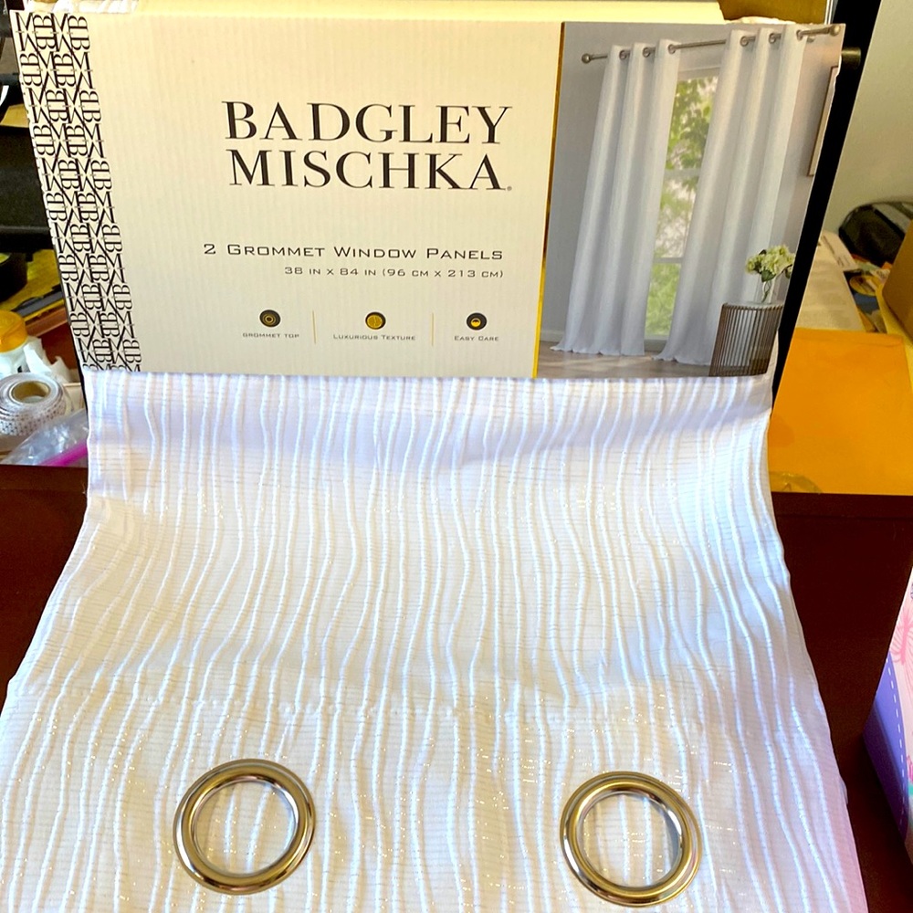 Badgley Mischka white & silver curtains.